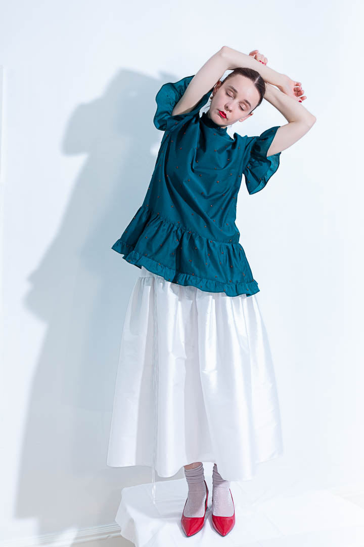 playful ruffle green top